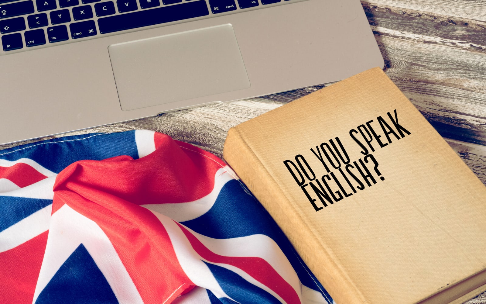Image showing English book and a laptop.